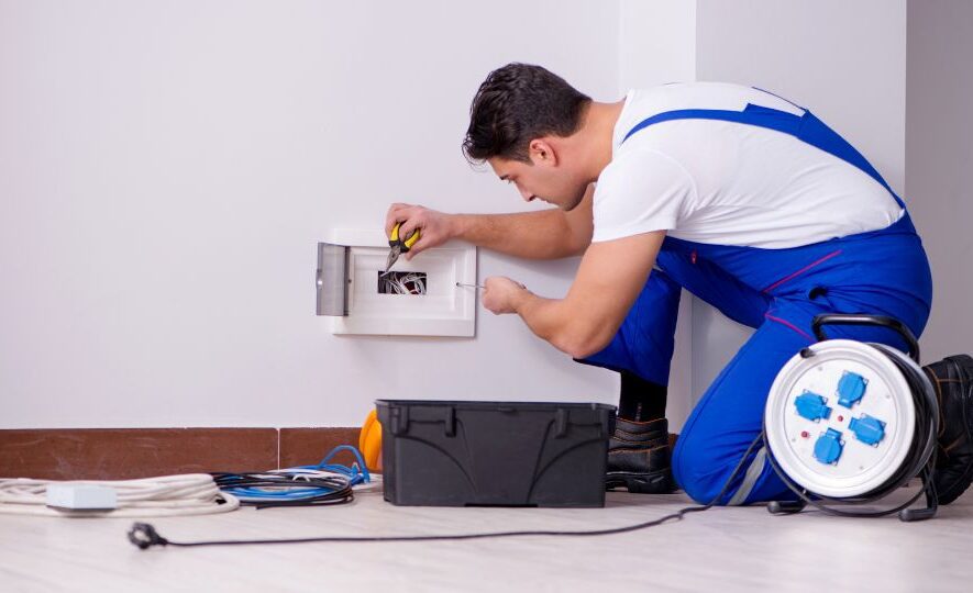 Man Doing Electrical Repairs at Home