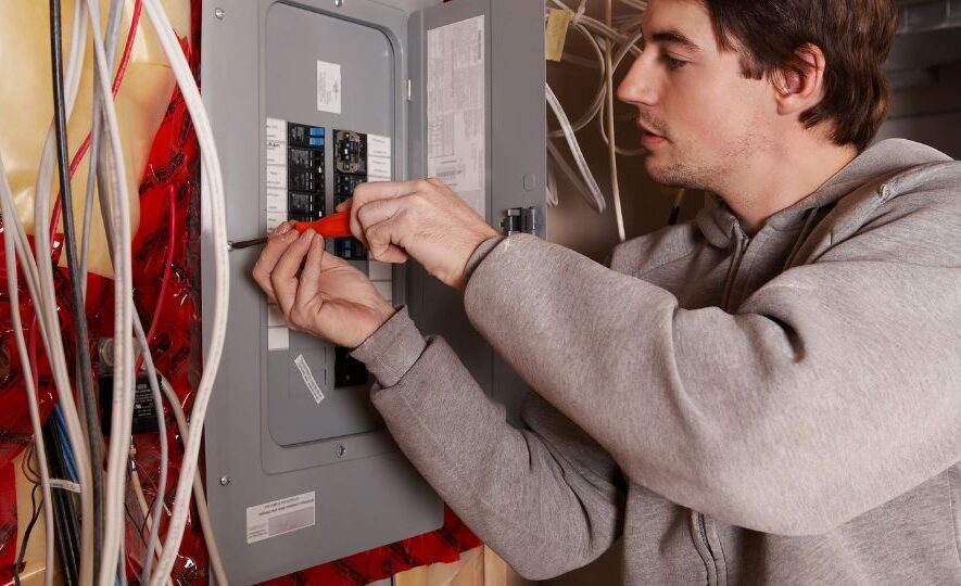 Man with Electric Panel