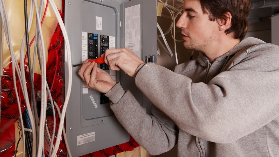 Man with Electric Panel